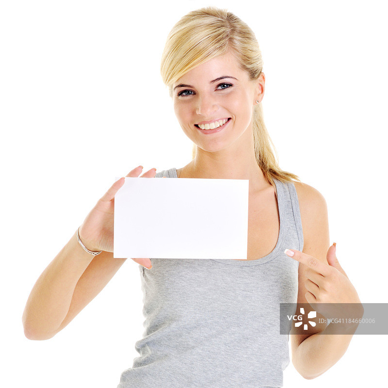 年轻漂亮的女人拿着名片图片素材