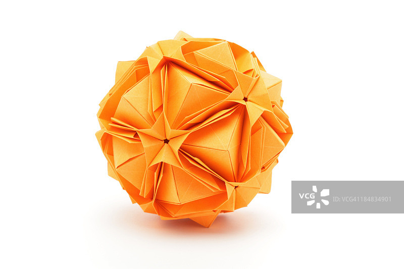 一个橙色折纸多面体纸艺设计图片素材