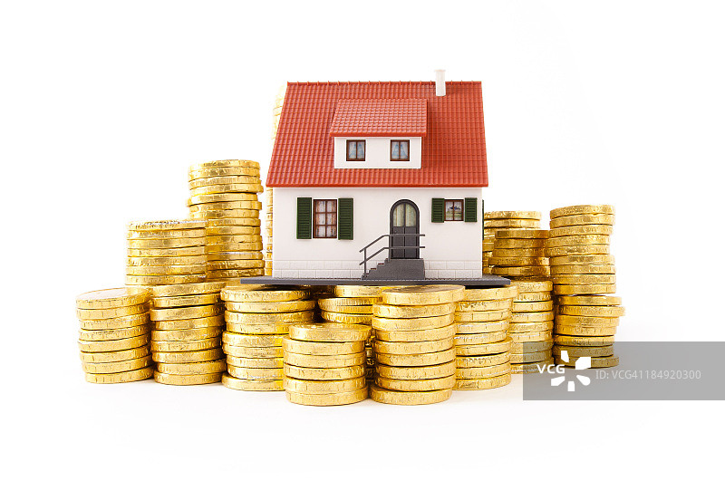 堆叠金钱上的房屋图片素材