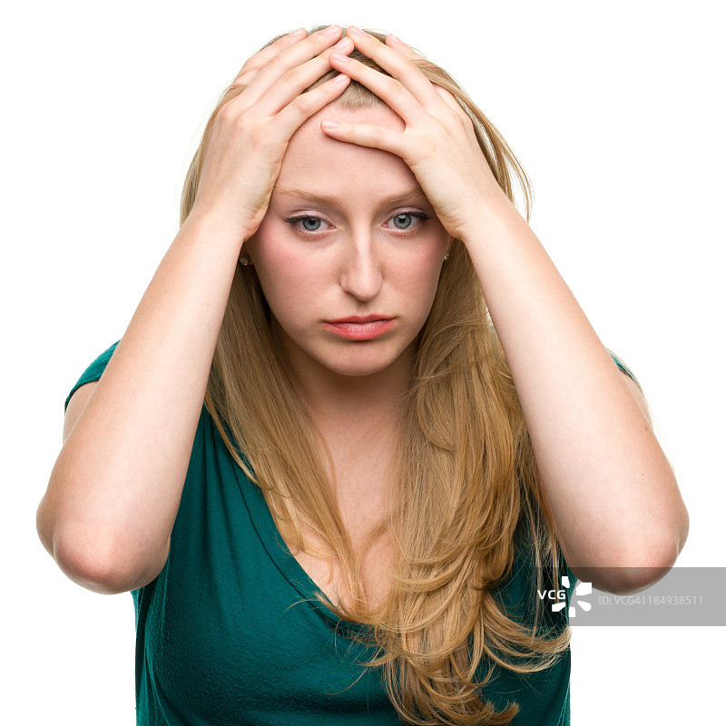 压力大的头痛年轻女子图片素材