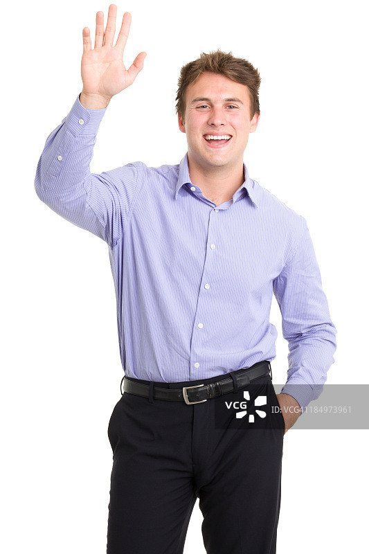 快乐的年轻男人挥手致意图片素材