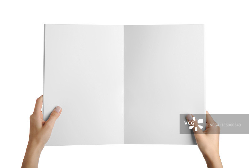 手持空白杂志页图片素材