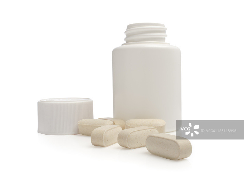 打开的药瓶与散落的药丸图片素材