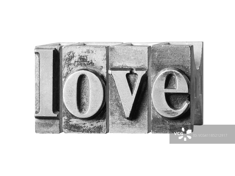 用金属印刷机字母写下的“爱”字图片素材