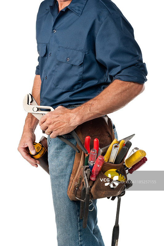 带工具腰带的修理工图片素材