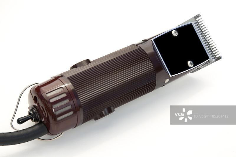 白色背景上的专业理发推剪图片素材