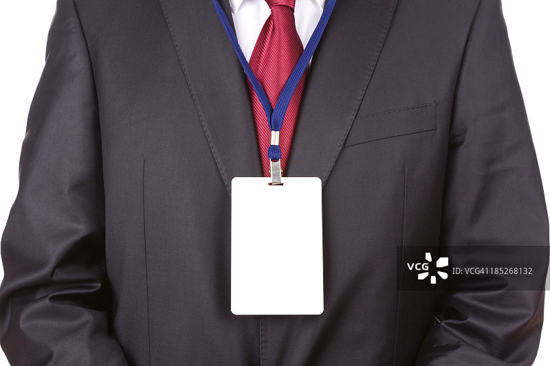 佩戴空白姓名牌的商人正面照图片素材