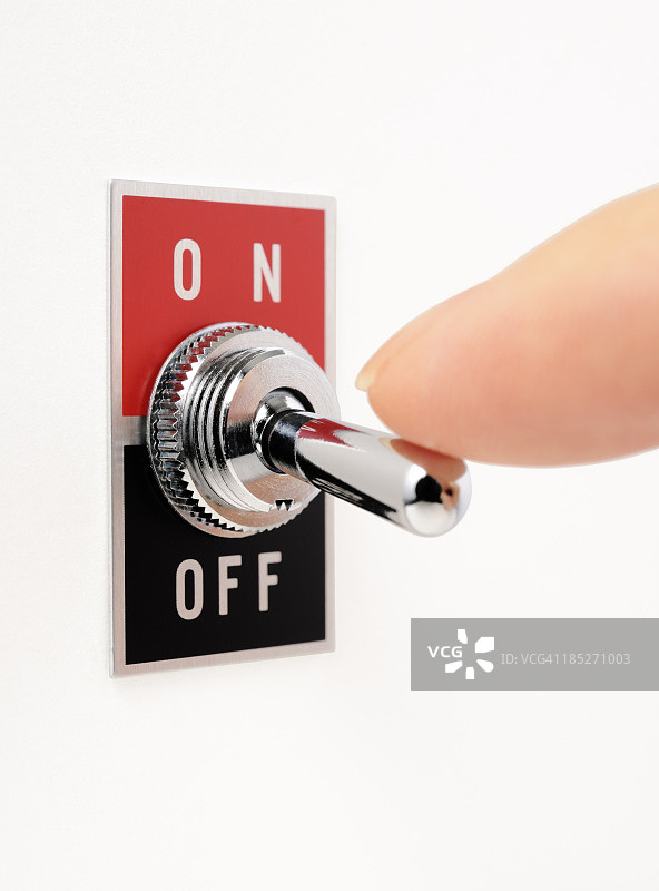 白色背景上手指按下的ON/OFF开关图片素材
