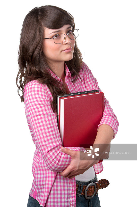 手捧书本认真的高中生图片素材