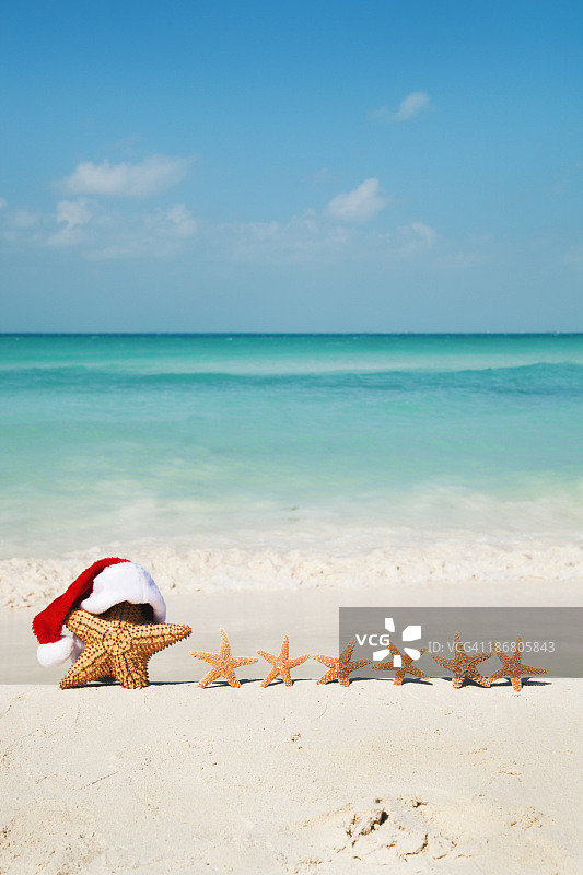 圣诞海滩圣诞老人、海星家庭热带假日图片素材