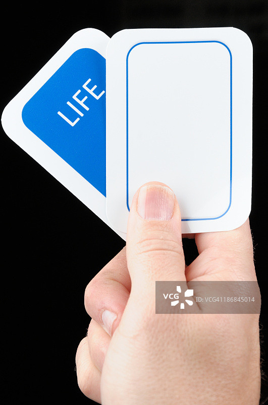 手持空白生活卡片图片素材