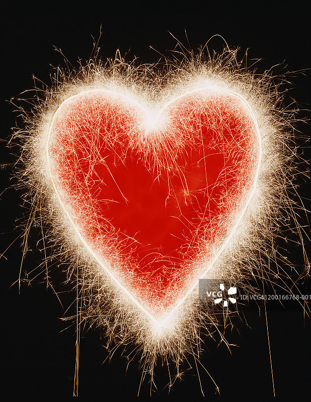 心形灯光周围的烟花图片素材