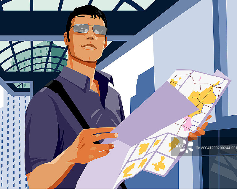 男人手持地图图片素材