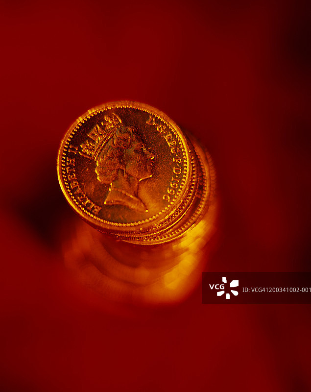 英国货币，英镑硬币堆图片素材