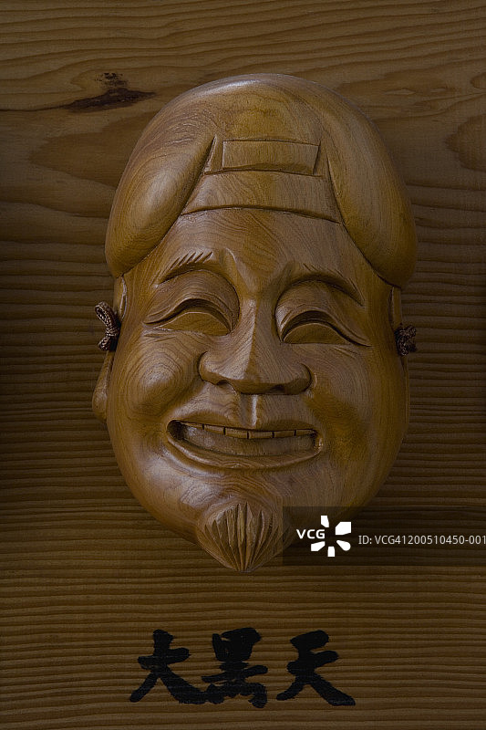 财富之神大黑天的木雕图片素材