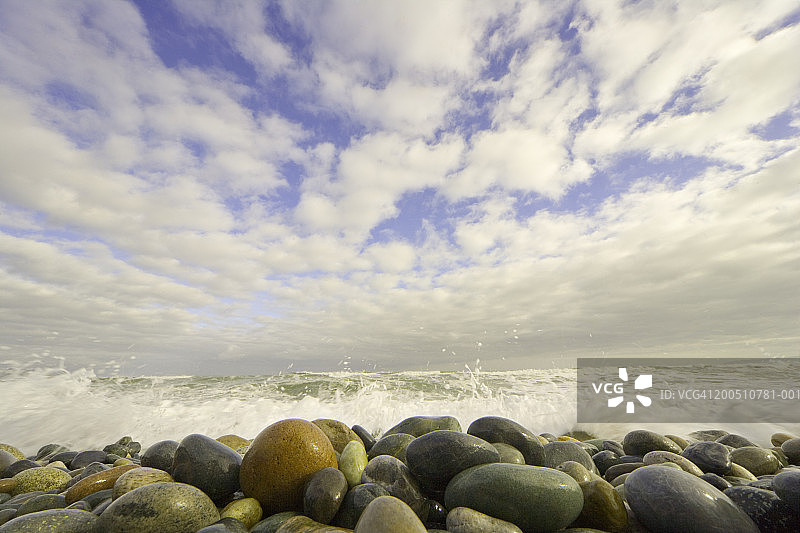 海浪拍打背景岩石海滩图片素材