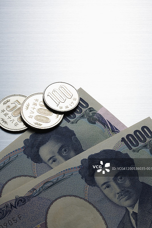 日式一千日元纸币和日元硬币图片素材