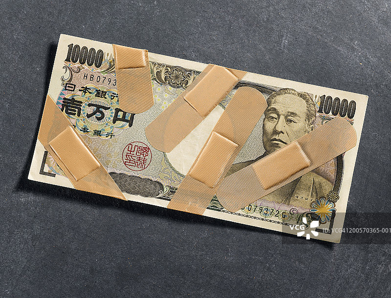 万元日元纸币上的绷带，俯视图图片素材