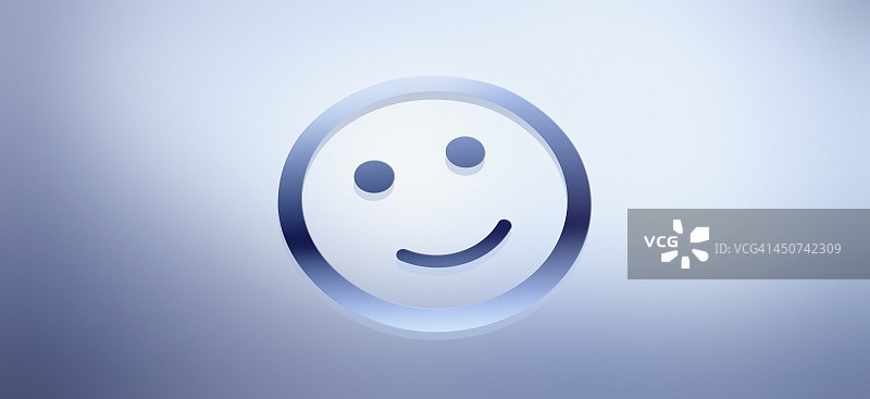 蓝色渐变背景上的笑脸图案图片素材