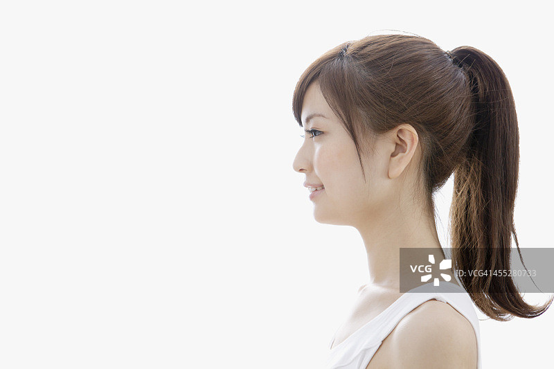 穿着背心的女子侧面像图片素材