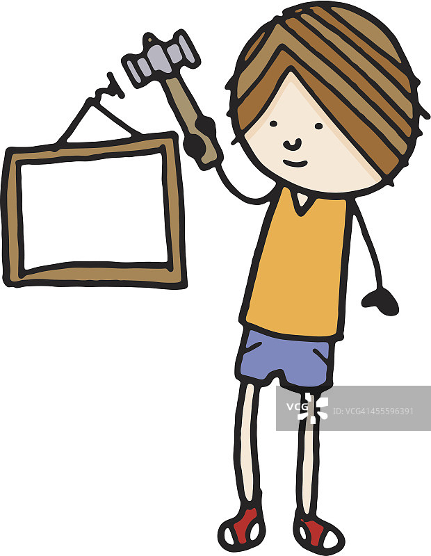 男孩用锤子挂相框图片素材