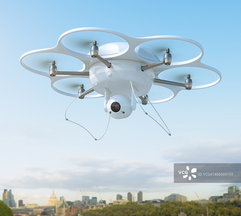 城市上空的带摄像头无人机图片素材