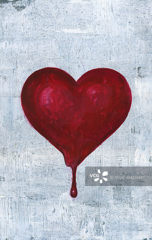 心碎的象征性图像：从心中滴落的鲜血图片素材
