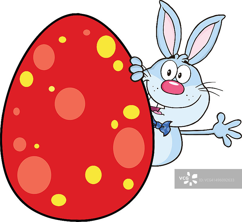 复活节彩蛋后面的蓝色兔子图片素材