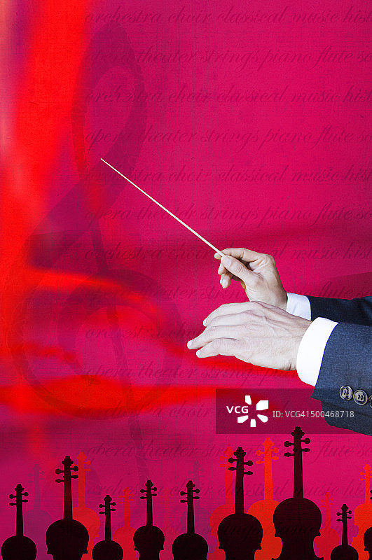 音乐指挥家的手和指挥棒图片素材