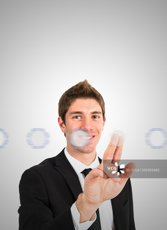 年轻商人滑动未来感界面图片素材