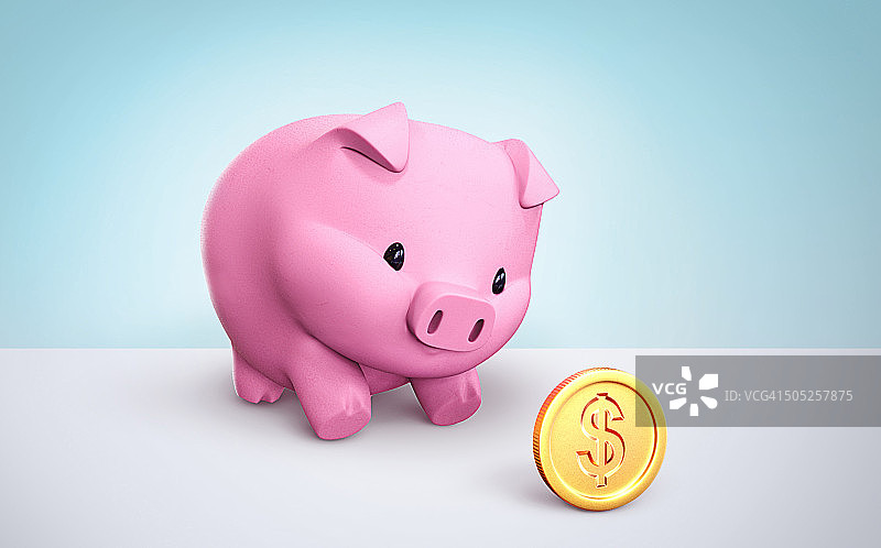 小猪储蓄罐与金色美元硬币图片素材
