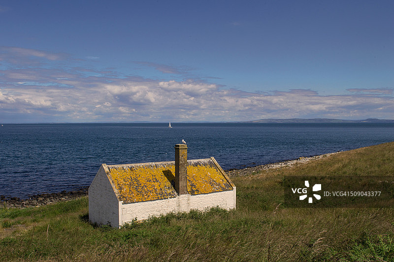 苏格兰普拉达岛上废弃的农舍图片素材