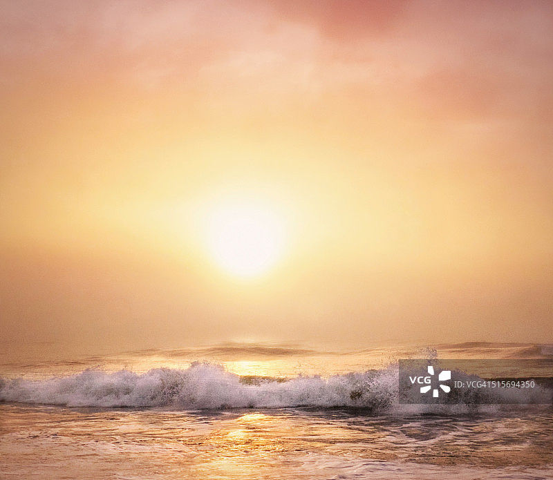 圣诞节早晨琼斯海滩的长岛海洋日出图片素材