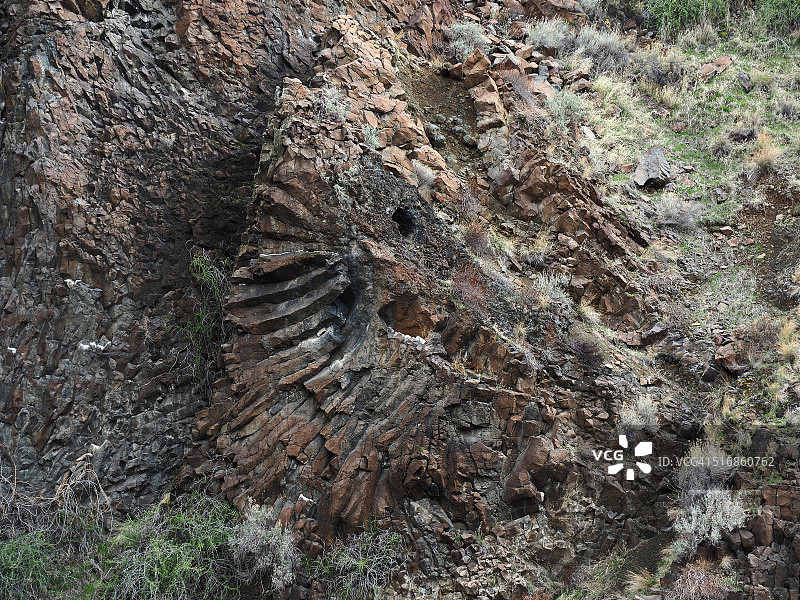 俄勒冈州约翰迪河沿岸的玄武岩柱图片素材