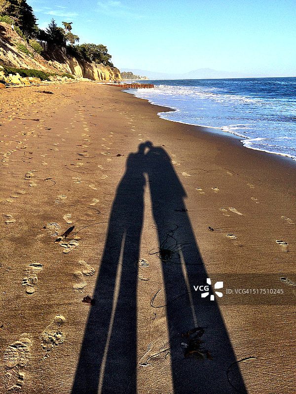 蝴蝶海滩上的影子图片素材