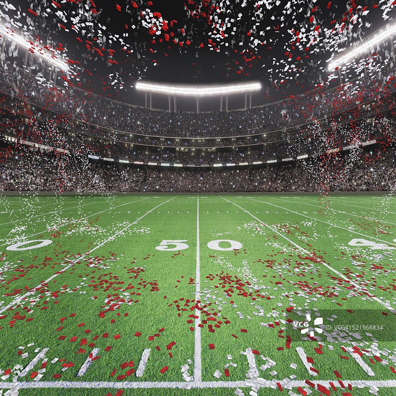带有飘落彩纸的美式橄榄球场，50码线视角图片素材