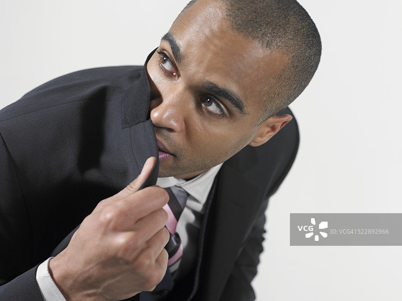 试图隐藏的商人图片素材