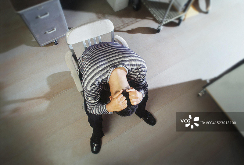 心烦意乱的商人俯视图图片素材