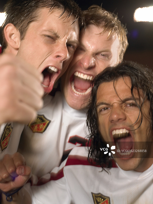 足球运动员庆祝胜利图片素材