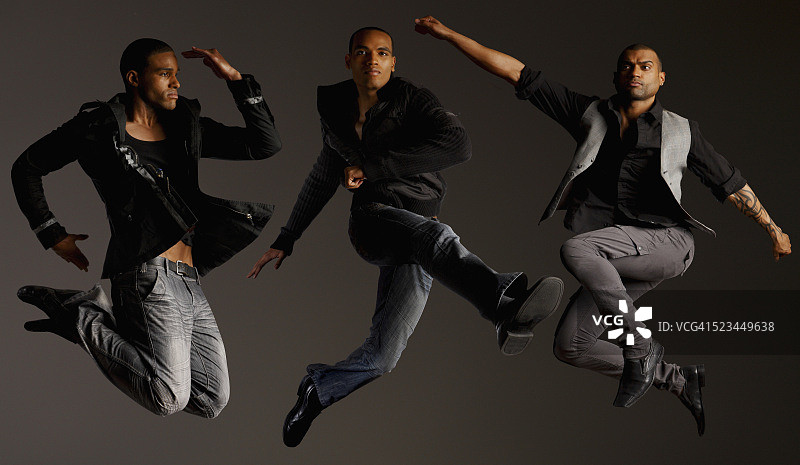 时尚男人们跳跃图片素材