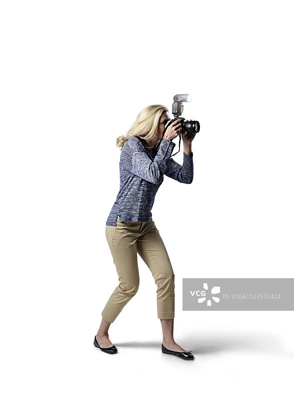 白色背景上的摄影师图片素材