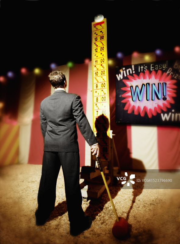 思考大力士游戏的商人图片素材