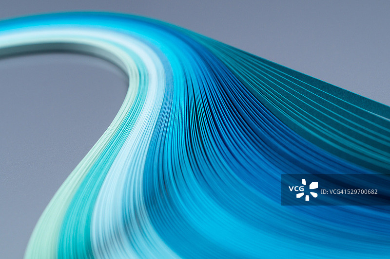 蓝色波浪形彩色纸条图片素材