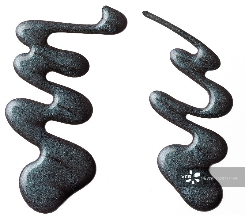 黑色指甲油泼洒图片素材