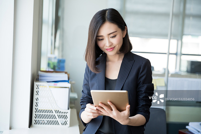 平板电脑女老板图片素材
