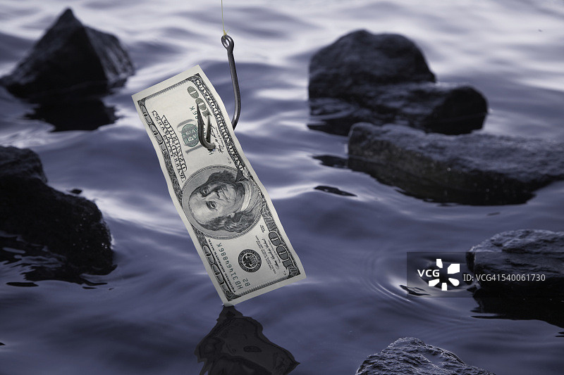 鱼钩上的美元纸币图片素材