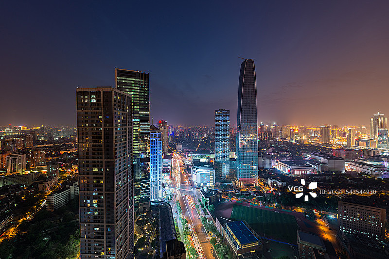 夜晚灯火通明的天津摩天大楼图片素材