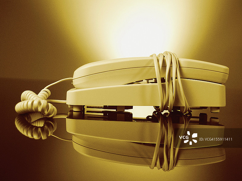 缠绕着电线的电话图片素材