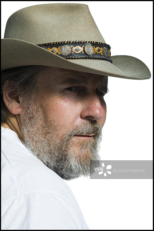 戴着牛仔帽的中年男人特写图片素材