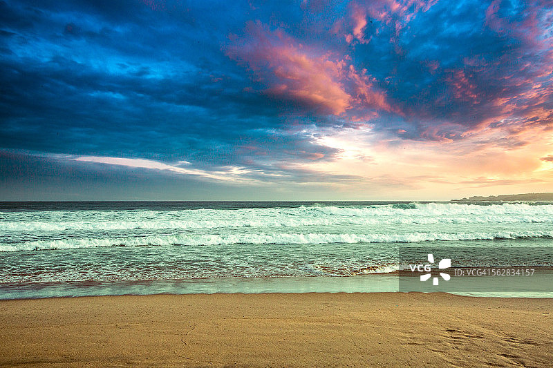 日落海滩波浪图片素材
